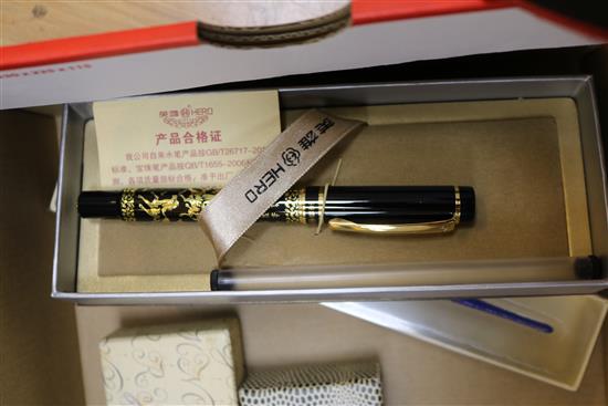 A collection of fountain pens and writing equipment
